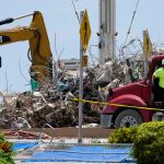 Death toll rises to 97 in Surfside condo collapse; judge approves sale of site