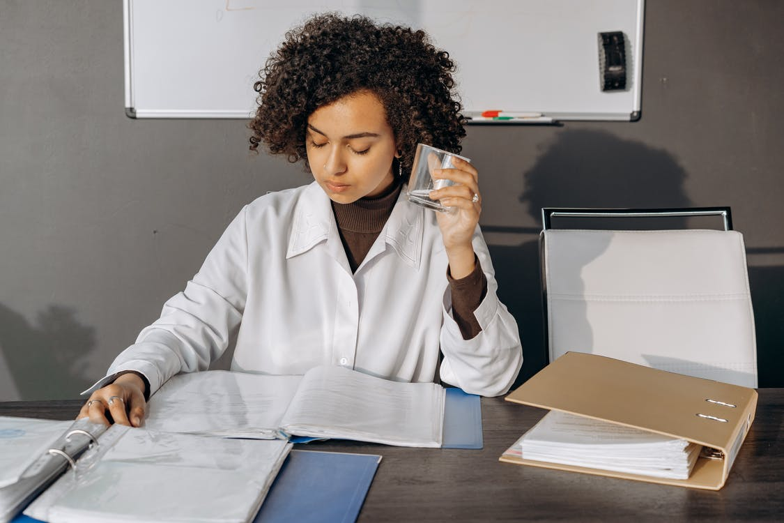 A professional accountant reviewing business files